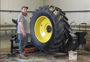 Tire mounting service at Harry's Farm Tire