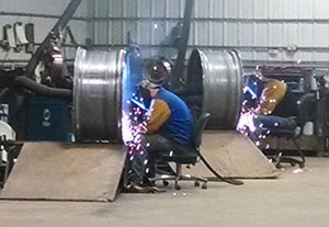 Welding at the rim and wheel shop, Harry's Farm Tire